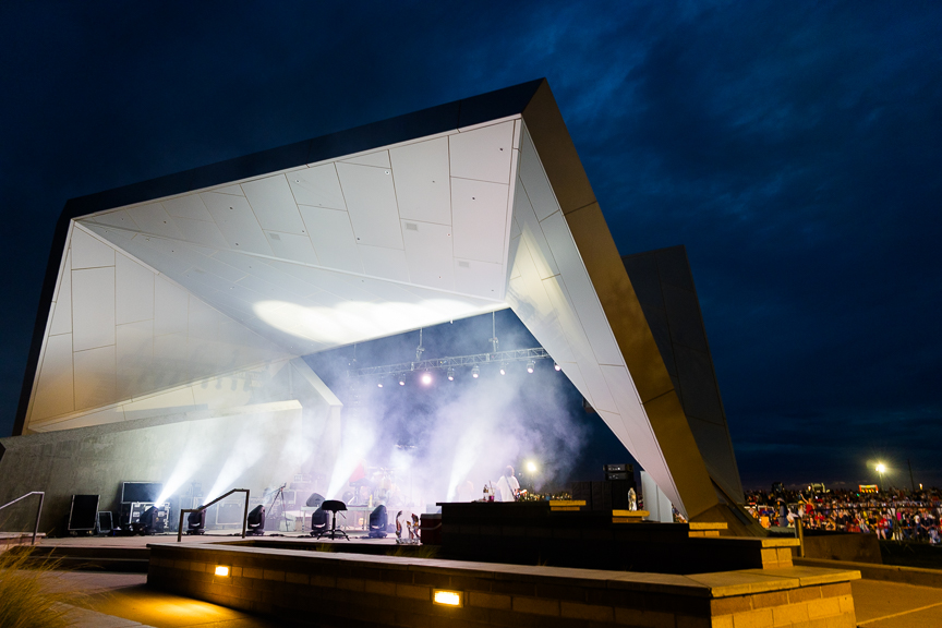 Outdoor Arizona festival stage illuminated at night